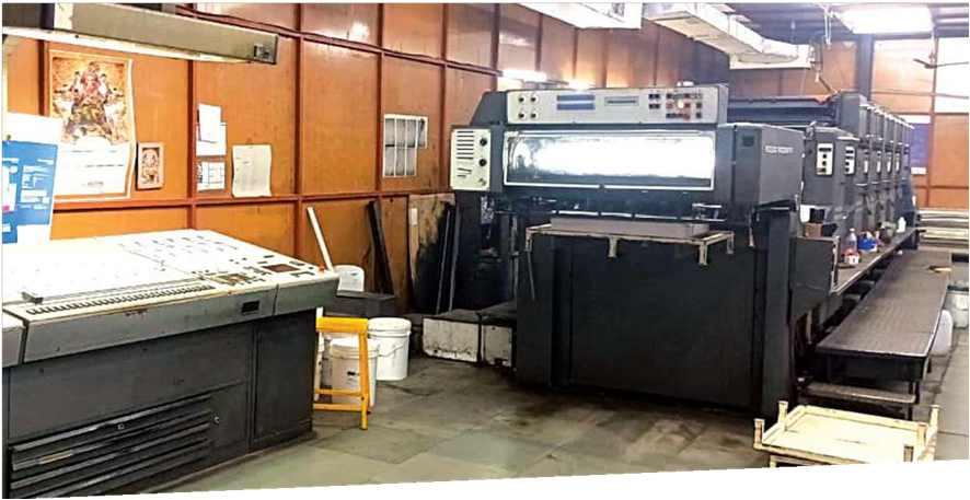 Printing press photographed on the original Adzone website